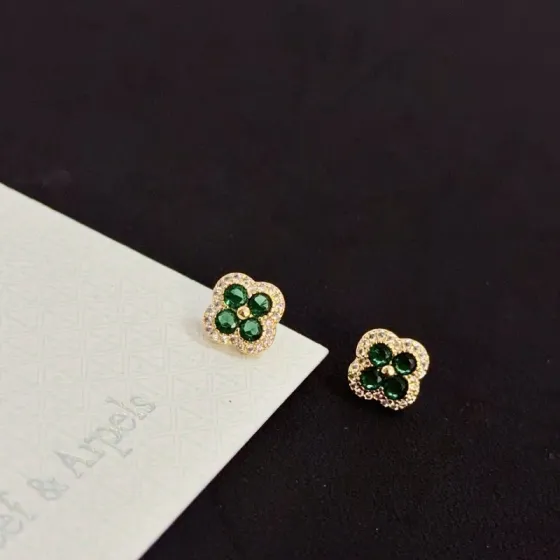 Van Cleef Arpels Alhambra earrings yellow gold metal with emerald green gemstones and white diamond accents 9mm stud diameter