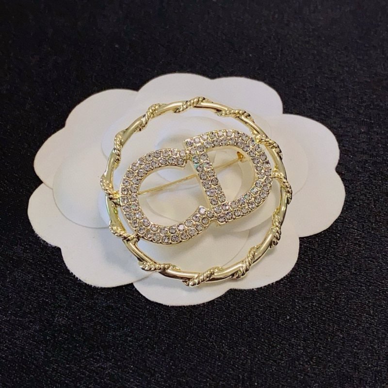 Dior CD Logo D Series brooch gold-tone metal with clear crystal rhinestones 3 2cm diameter