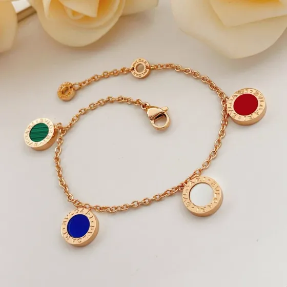 Bvlgari Bvlgari bracelet rose gold metal with red green malachite blue and white mother-of-pearl stone accents 18cm
