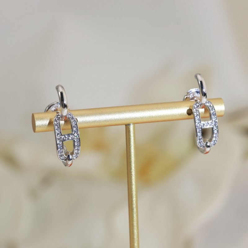 Hermes Crescendo earrings silver-toned metal with clear pave diamonds 1 2cm drop length
