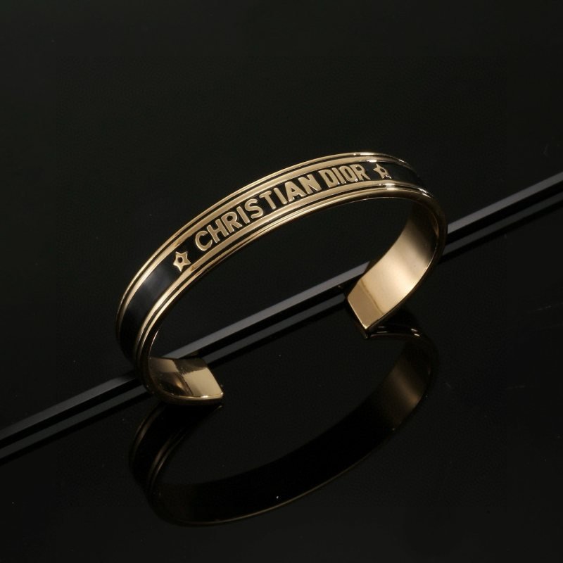 Dior Christian Dior Star Logo Cuff bracelet gold-tone metal with black enamel 17cm inner circumference