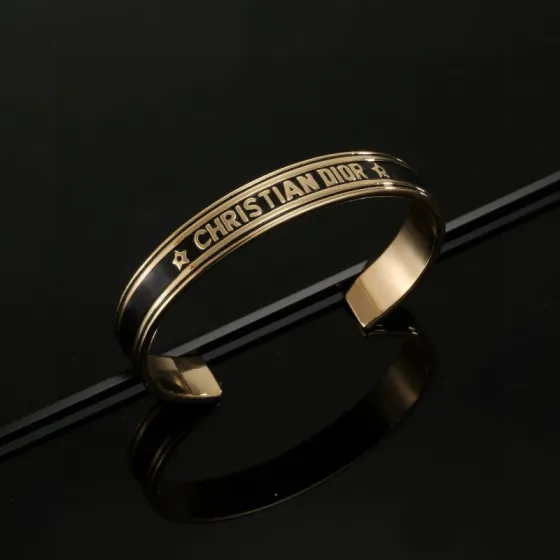 Dior Christian Dior Star Logo Cuff bracelet gold-tone metal with black enamel 17cm inner circumference