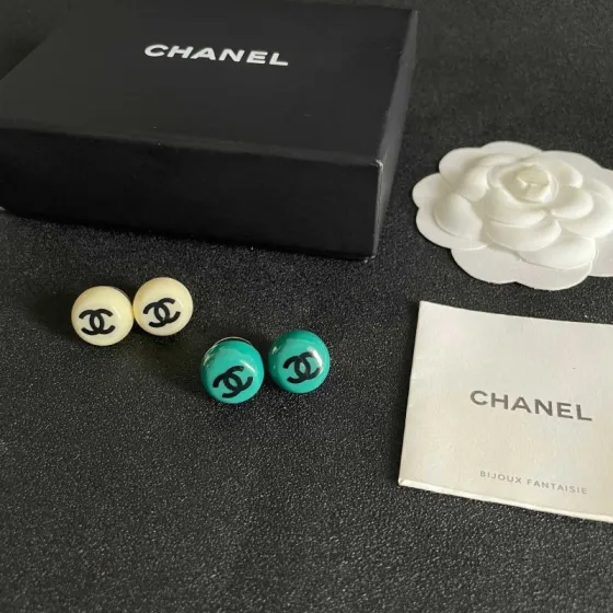 Chanel CC Logo Round Stud Earrings earrings Turquoise resin with black interlocking CC logo silver-toned metal hardware 1 2cm diameter