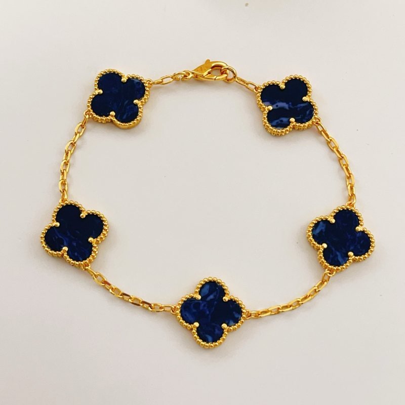 Van Cleef Arpels Alhambra bracelet Yellow gold with dark blue pietersite stone inlays 18cm