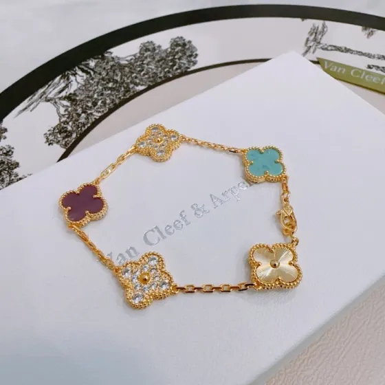 Van Cleef Arpels Alhambra bracelet yellow gold with turquoise purple rhodonite clear diamond and guilloche gold four-leaf clover motifs 17cm