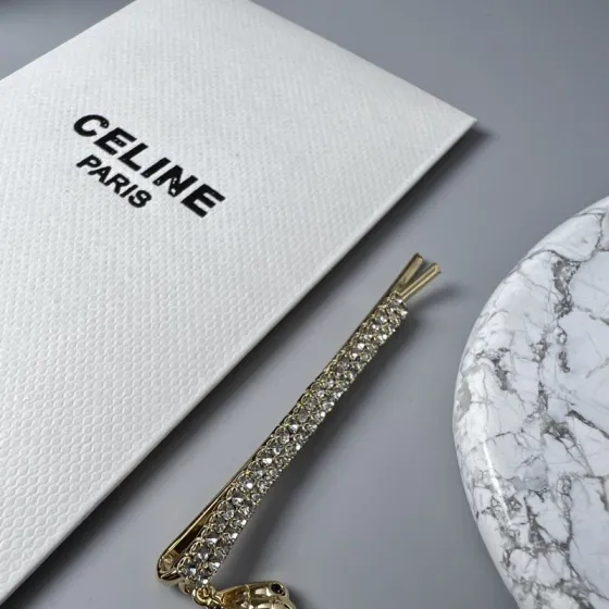 Celine Crystal Shell Charm Bobby Pin brooch Gold-tone metal with clear crystals and dark blue accent stones Silver-tone metal with clear crystals and dark blue accent stones 6cm