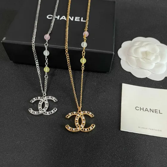 Chanel CC Logo Pastel Bead Pearl Necklace necklace Gold-tone metal with white faux pearls pastel pink frosted clear and pale yellow accent beads 42cm