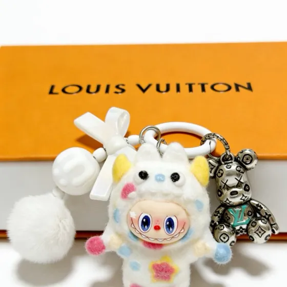 Louis Vuitton Anger Forest Custom Labubu Bear Keychain pendant Silver-tone metal with turquoise LV logo white plush with pastel pink blue yellow accents white pom-pom and bow accents 8cm total length