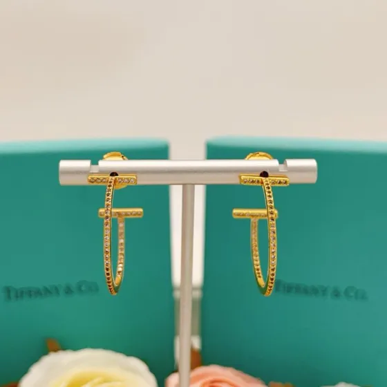 Tiffany Co T Wire Hoop earrings 18k yellow gold with clear diamond pave 25mm hoop diameter