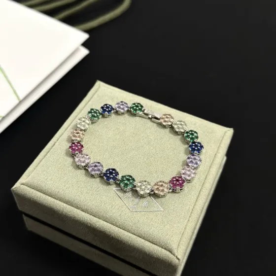 Van Cleef Arpels Fleurette bracelet silver-toned metal with multicolor gemstones green blue purple pink red champagne clear 17cm