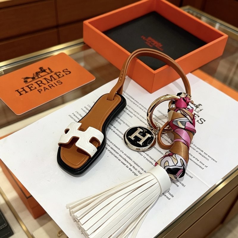 Hermes Oran Sandal Tassel Key Charm pendant Gold-tone metal tan leather white leather black enamel multicolor pink tan white black silk twill 12cm total length