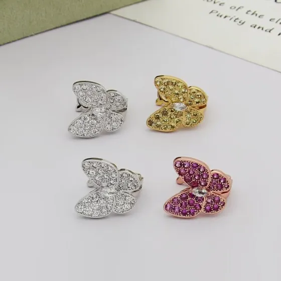 Van Cleef Arpels Two Butterfly earrings White gold with colorless diamonds yellow gold with yellow sapphires and colorless diamond rose gold with pink sapphires and colorless diamond 12mm butterfly width