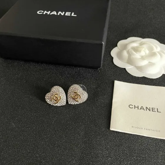 Chanel CC Heart Crystal Stud Earrings earrings silver-tone metal base gold-tone interlocking CC logo clear crystal pave 1 5cm diameter per earring