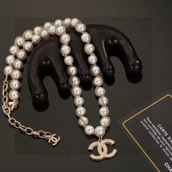 Chanel CC Logo Pearl Chain necklace gold-tone metal white faux pearl clear crystal 42cm