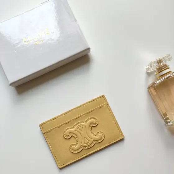 Celine Triomphe card holder pastel yellow smooth leather with matching tone embossed Triomphe logo 10 5 x 7cm