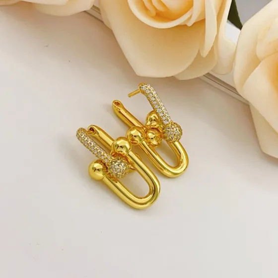 Tiffany Co HardWear earrings 18k yellow gold with pave set clear diamonds 2 5cm length