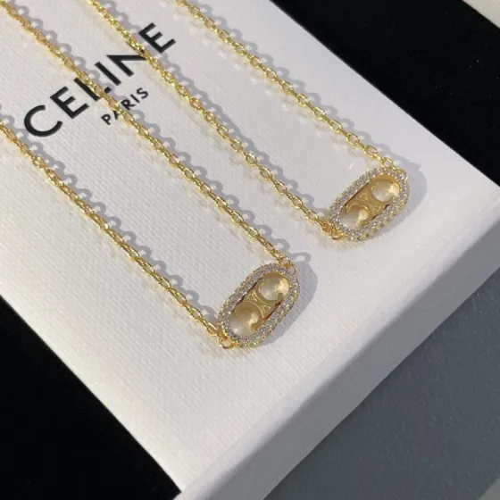 Celine Triomphe Oval Crystal Pearl bracelet gold-tone metal with clear crystals and white pearl accents 18cm
