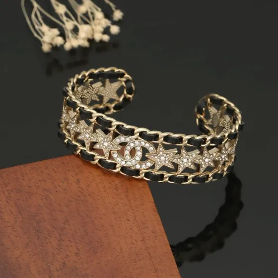 Chanel CC Star Crystal Chain Cuff bracelet Gold-tone metal black leather clear crystal One Size Open