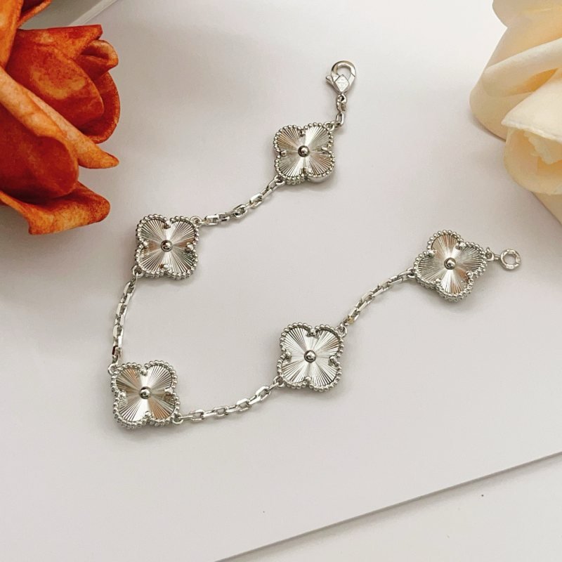 Van Cleef Arpels Vintage Alhambra bracelet silver-toned metal with guilloche engraved clover motifs 18cm