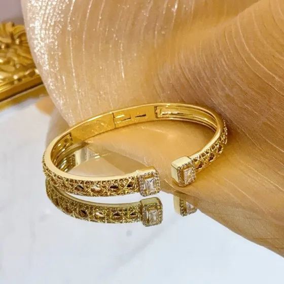Piaget Possession Open Cuff Bangle bracelet 18k yellow gold with clear diamond accents 16cm inner circumference