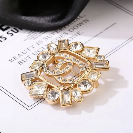 Chanel CC Logo Multi-Cut Crystal Brooch brooch gold-tone metal with clear faceted crystals 3 5cm diameter