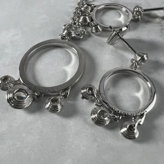 Cartier Agrafe earrings silver-toned white gold with clear diamonds one size