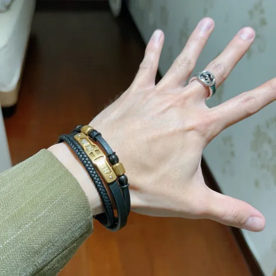 Hermes Anger Forest bracelet Black leather with gold-tone metal hardware and black bead accents 19cm