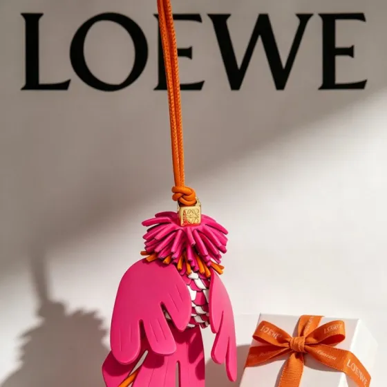 Loewe Anagram Bird Charm pendant Gold-tone metal fuchsia pink leather orange leather white leather black resin white resin eye detail 12cm strap length