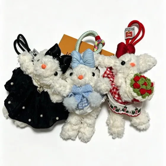 Louis Vuitton Anger Forest Plush Bunny Keychain pendant white plush black fabric dress with white faux pearls silver-tone metal hardware black satin bow white enamel flower charm coral pink nose black elastic strap 12cm plush with 8cm wrist