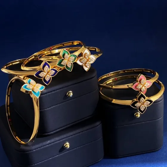 Roberto Coin Love in Verona bracelet Yellow gold with diamond accents assorted enamel blue green white pink black turquoise and mother-of-pearl flower details 17cm