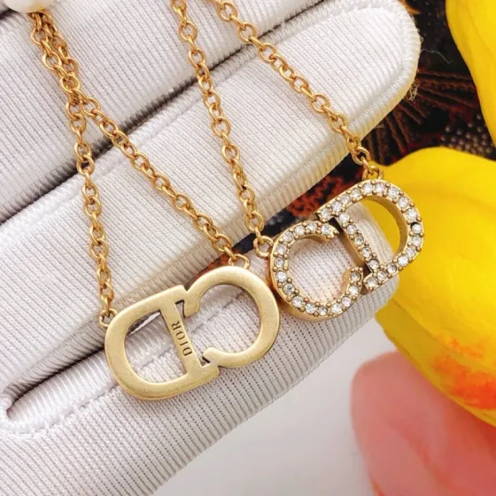 Dior CD Logo Pearl Drop earrings vintage gold metal white pearl clear crystal 4 5cm drop length