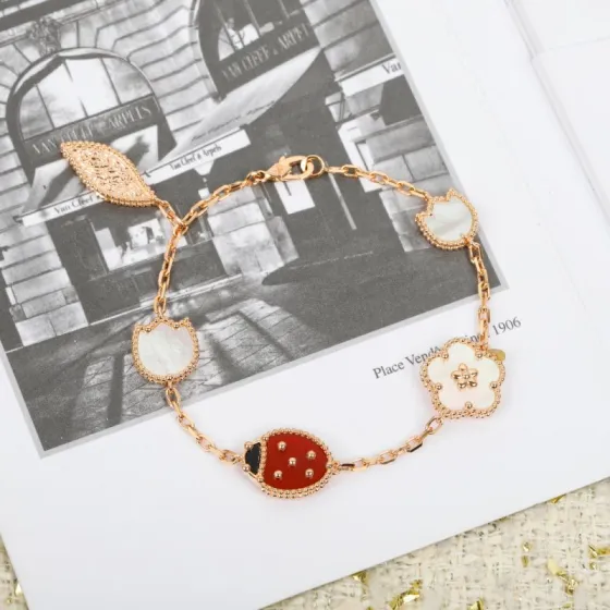 Van Cleef Arpels Lucky Spring bracelet Rose gold white mother-of-pearl red carnelian black onyx 17cm