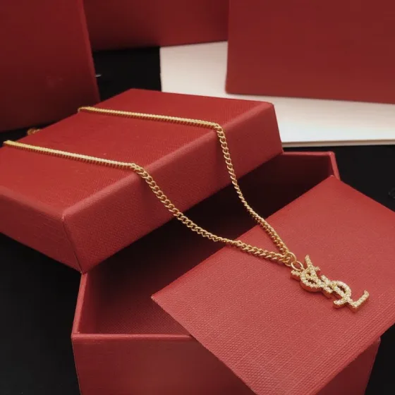 Saint Laurent YSL Monogram Crystal Pendant Necklace necklace gold-tone metal with clear crystal pave 45cm with 5cm extender