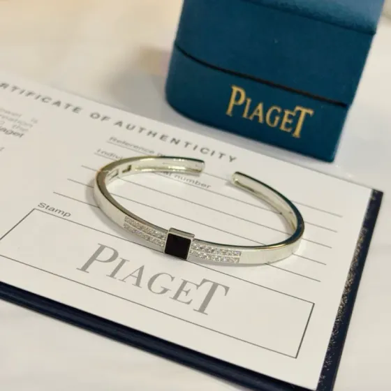 Piaget Possession bracelet Silver-toned metal with clear pave diamonds and black onyx accent 17cm
