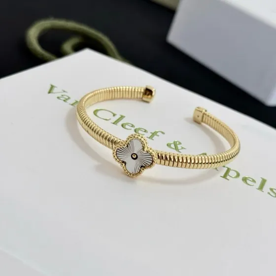 Van Cleef Arpels Alhambra Four-Leaf Clover bracelet Yellow gold with silver guilloche clover motif 17cm