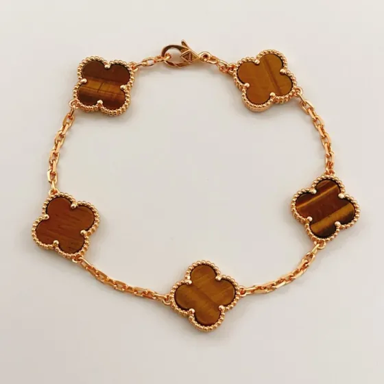 Van Cleef Arpels Vintage Alhambra bracelet Rose gold with brown tiger s eye stone inlays 18cm