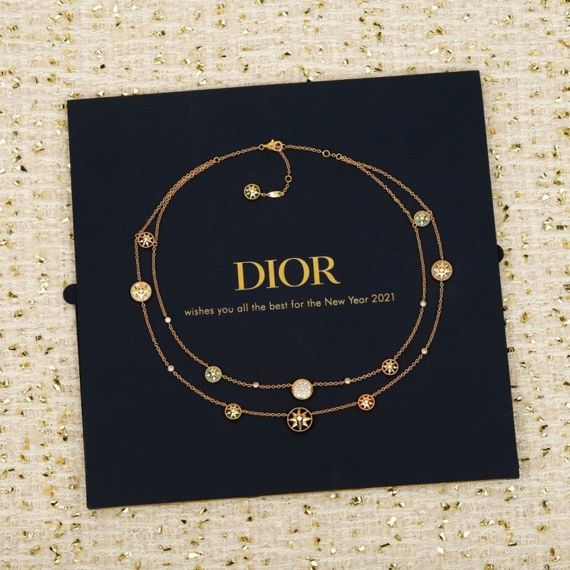 Dior Compass Rose necklace Available in yellow gold silver rose gold metal tones with clear diamond accents and multicolor enamel compass details 42cm with 5cm extender