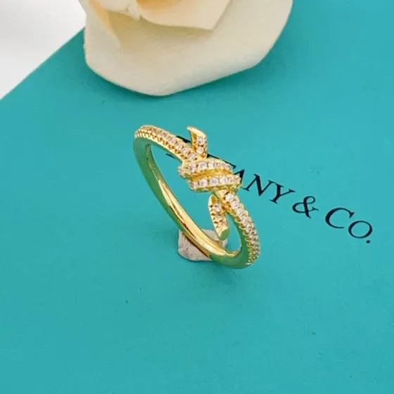 Tiffany Co Knot ring yellow gold with clear pave diamonds 7