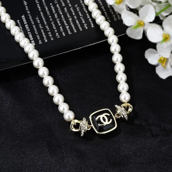 Chanel Goose Square CC Pearl Necklace necklace Gold-tone metal white faux pearls black enamel clear crystals 42cm with 5cm extender chain