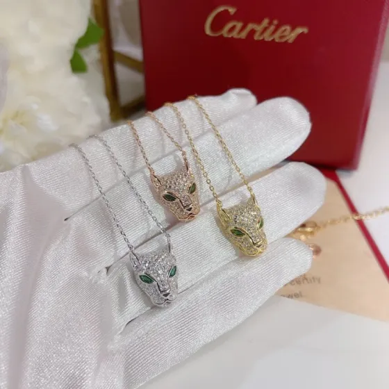 Cartier Panthere de Cartier necklace Available in yellow gold rose gold white gold set with pave diamonds green gemstone eyes black onyx nose detail 40-45cm