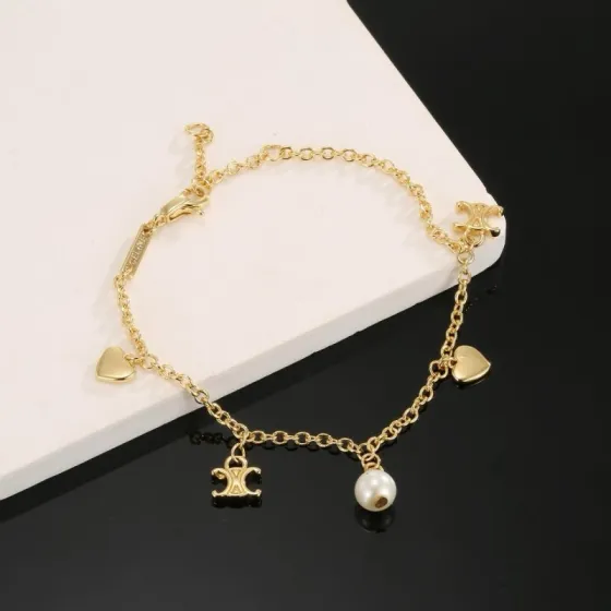 Celine Triomphe Heart Pearl Charm Bracelet bracelet gold-tone metal with white faux pearl 18cm with 3cm extender