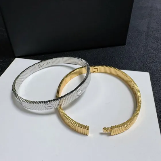 Cartier Love Ribbed Cuff bracelet 18k yellow gold and 18k white gold no gemstones 17cm inner circumference