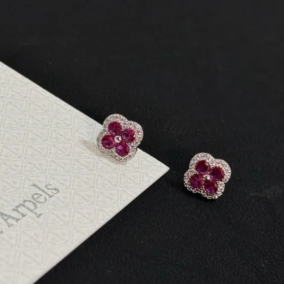 Van Cleef Arpels Alhambra earrings white gold metal ruby red gemstones white diamond accents 8mm stud diameter