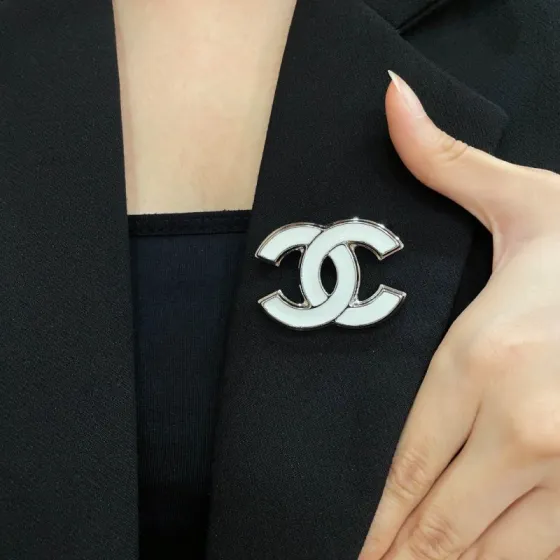 Chanel CC Logo brooch silver-toned metal with white enamel 3cm width