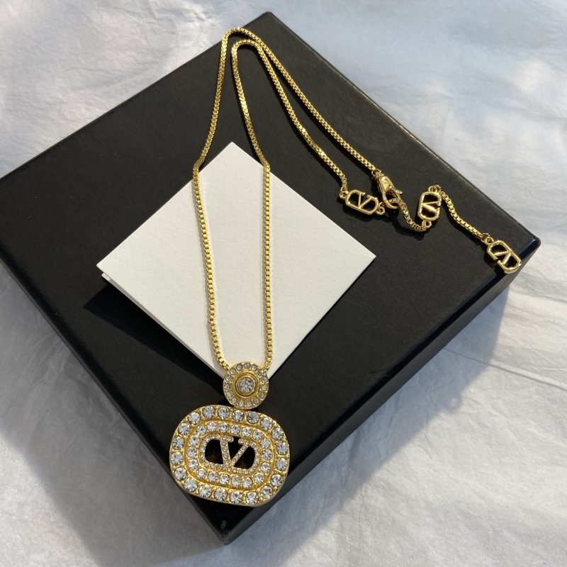 Valentino VLogo Signature Crystal Pendant necklace gold-tone metal with clear crystal rhinestones 45cm with 5cm extender