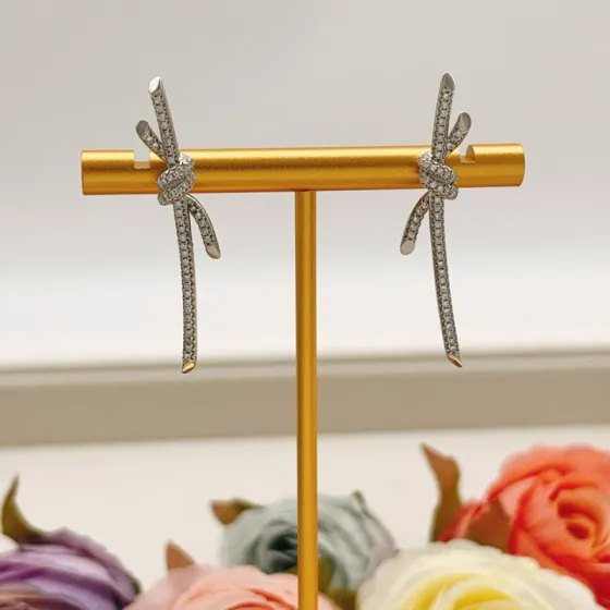 Tiffany Knot earrings silver-toned metal with clear pave diamonds 3 5cm drop length