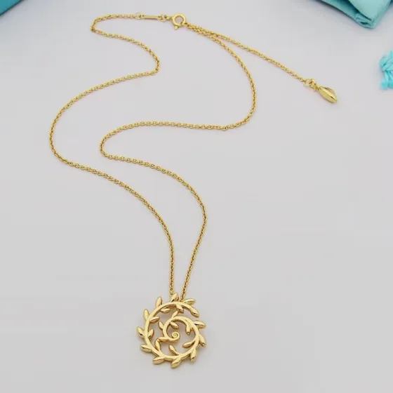 Tiffany Co Paloma Picasso Olive Leaf Spiral necklace 18k yellow gold 18 inches