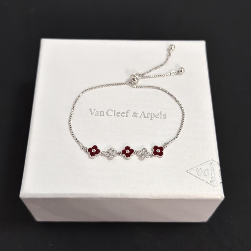 Van Cleef Arpels Alhambra bracelet silver-toned metal deep red carnelian-style enamel clear diamond accents adjustable slider chain 16-20cm