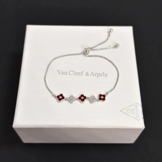 Van Cleef Arpels Alhambra bracelet silver-toned metal deep red carnelian-style enamel clear diamond accents adjustable slider chain 16-20cm