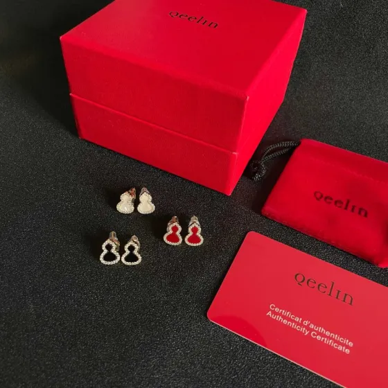 Qeelin Wulu earrings 18k rose gold with diamonds available in mother-of-pearl red agate and open diamond versions mini